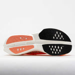 On Cloudboom Strike running shoe sole view showing orange and white outsole pattern