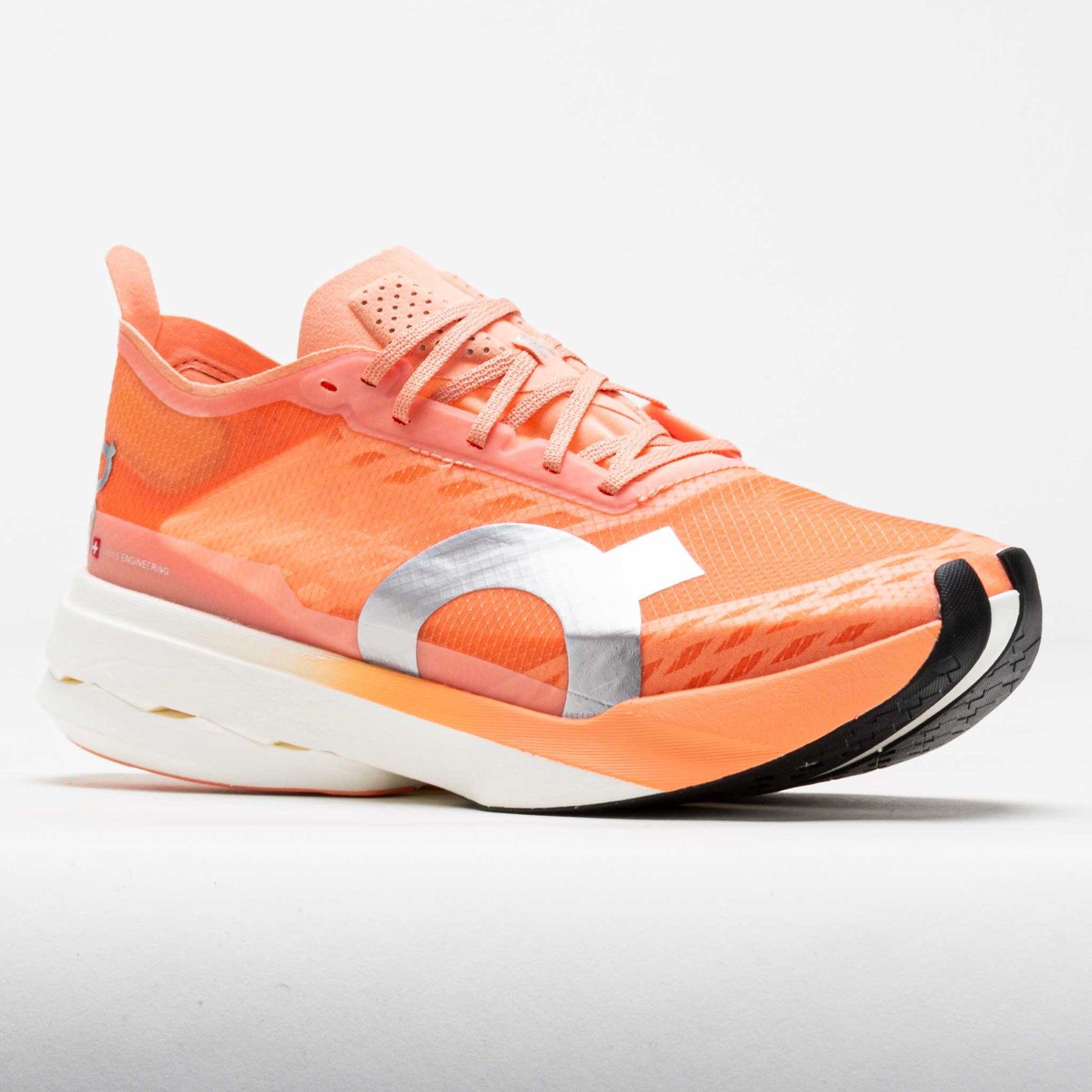 On Cloudboom Strike women's running shoe in sunstone orange with white sole