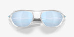Oakley Cage Jacket sunglasses front view with clear frame and blue Prizm Deep Water polarized lenses