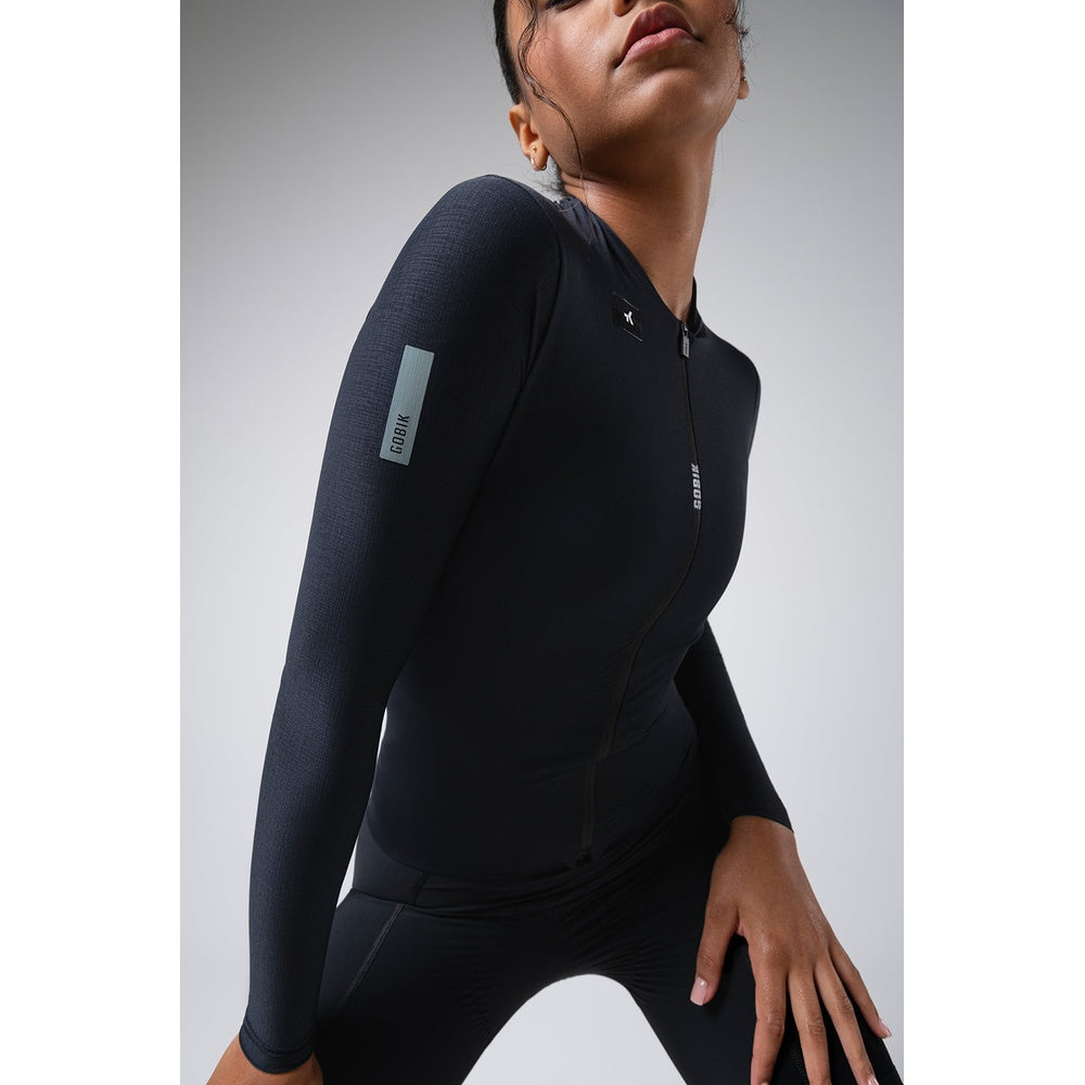 Woman wearing Gobik Avalon long sleeve cycling jersey in ink black color