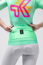 Gobik CX Pro 4.0 cycling jersey in Blast colorway shown from back on female model