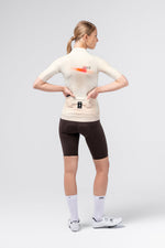 Gobik CX Pro 4.0 women's cycling jersey rear view in almond colorway showing back pockets and branding