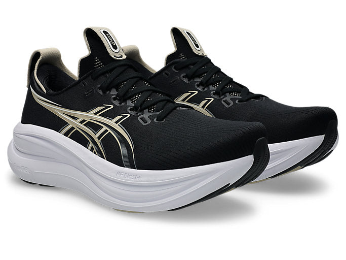 ASICS Gel Nimbus 28 running shoes in black with gold accents and white sole
