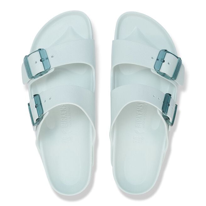 Birkenstock Arizona EVA sandals in Surf Green with translucent teal buckles, top view