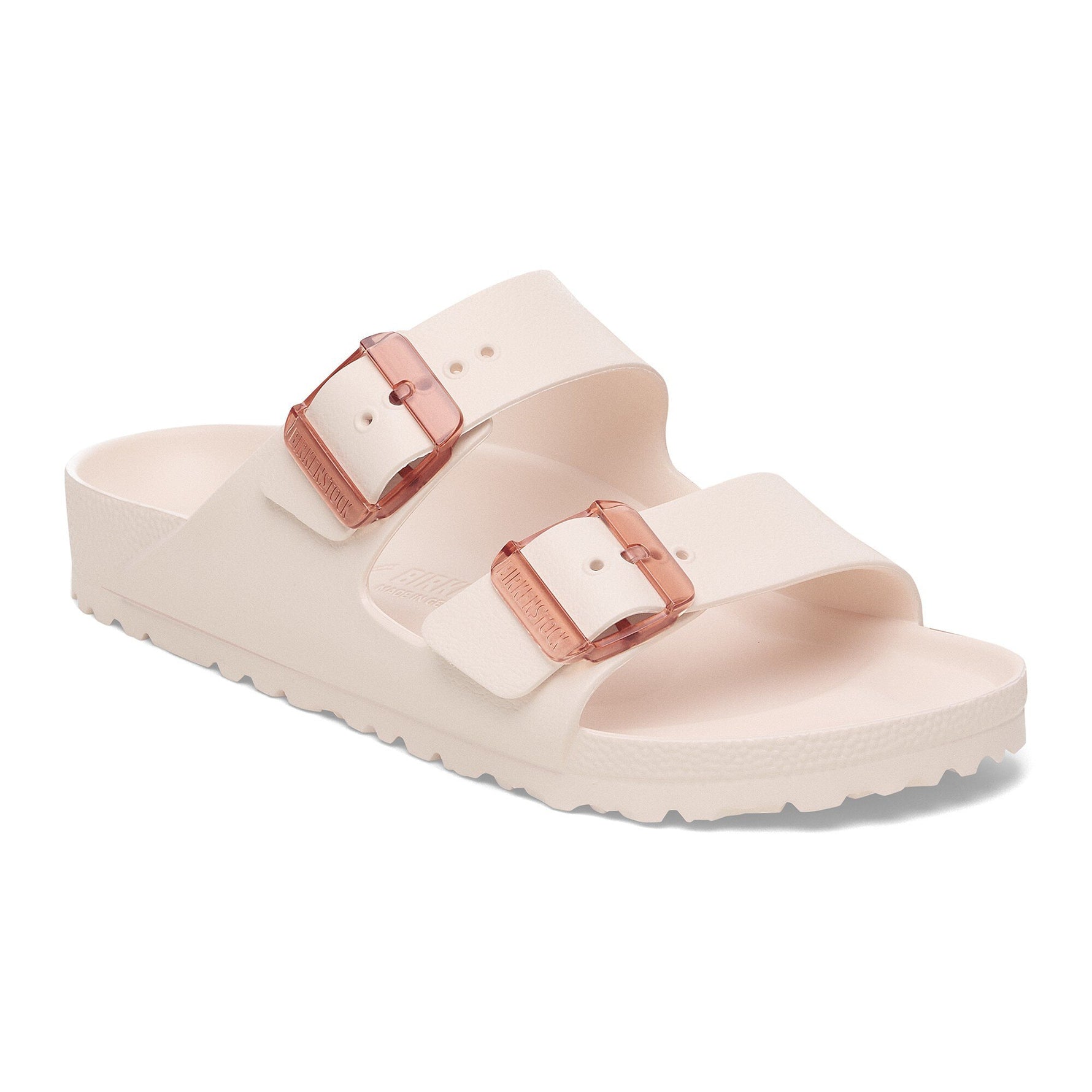 Birkenstock Arizona EVA sandal in light rose with translucent pink buckles on white background