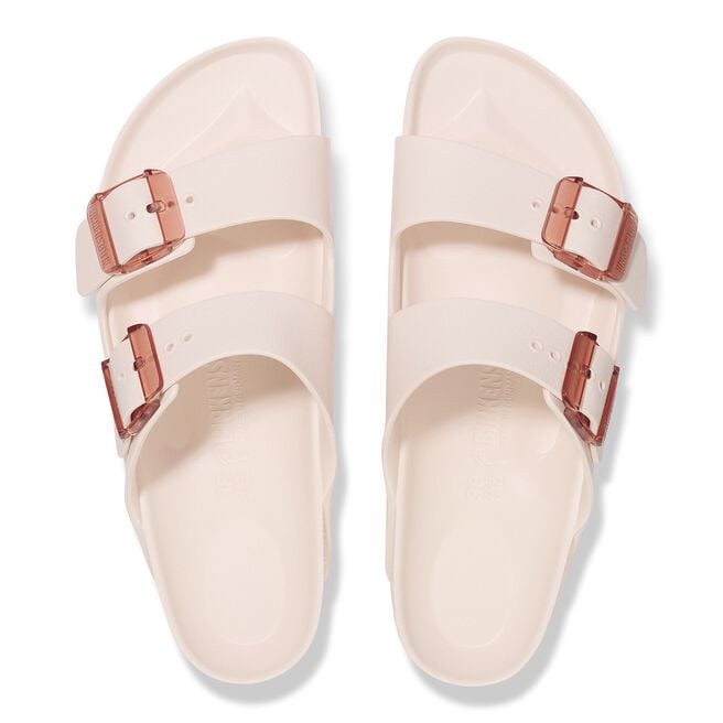 Birkenstock Arizona EVA sandals in light rose with translucent buckles, top view