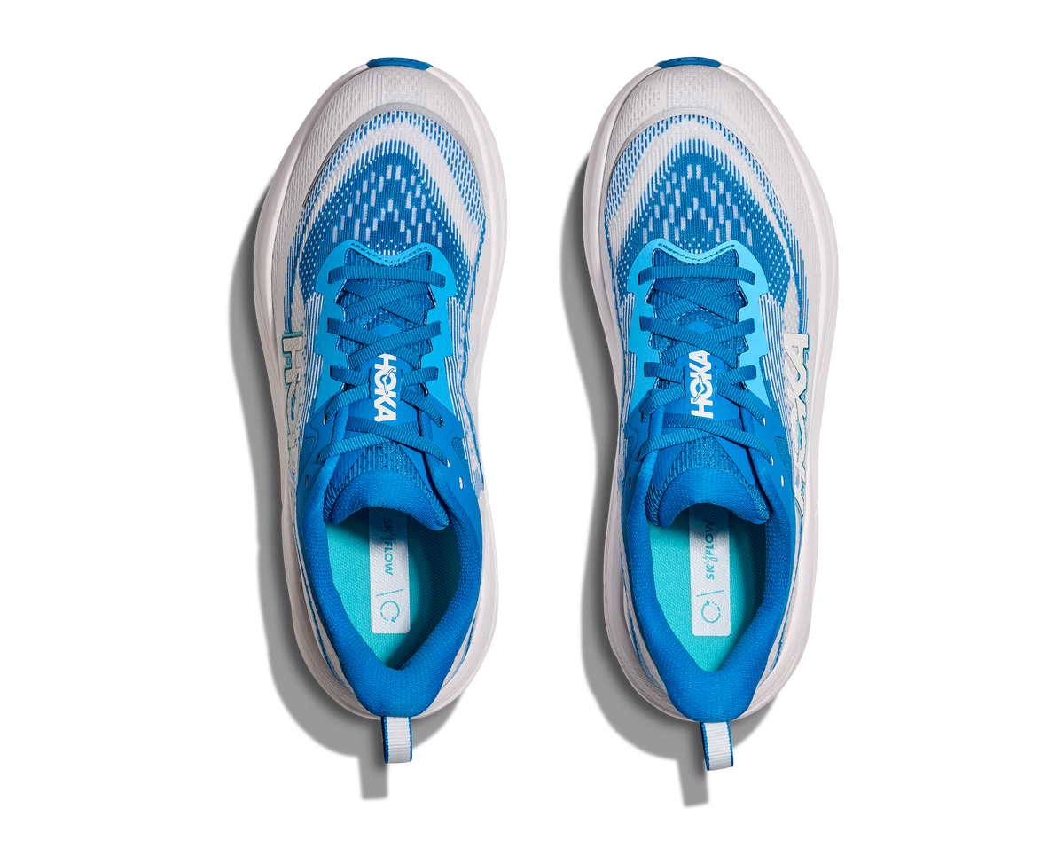 Pair of HOKA Skyflow running shoes top-down view showing blue and white upper