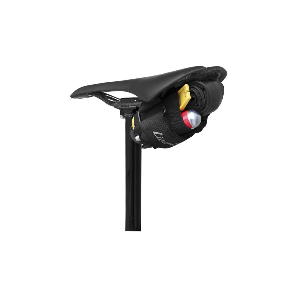 Black Lizard Skins utility strap attached to bicycle seat post with tools and light
