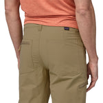 Back view of Patagonia Men's Quandary Convertible Pants in classic tan