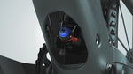 Close-up of Scott Spark RC World Cup carbon frame pivot linkage with blue anodized hardware