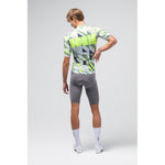 Back view of male model wearing Gobik CX Pro cycling jersey with geometric triangle pattern