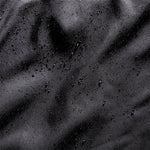 Brooks Fusion Hybrid Jacket 2.0 in black with water-repellent droplets on surface