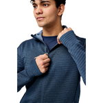 Man wearing Brooks blue heathered zip-up hoodie with ribbed texture pattern
