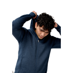 Man wearing Brooks Activate navy blue zip-up hoodie against white background