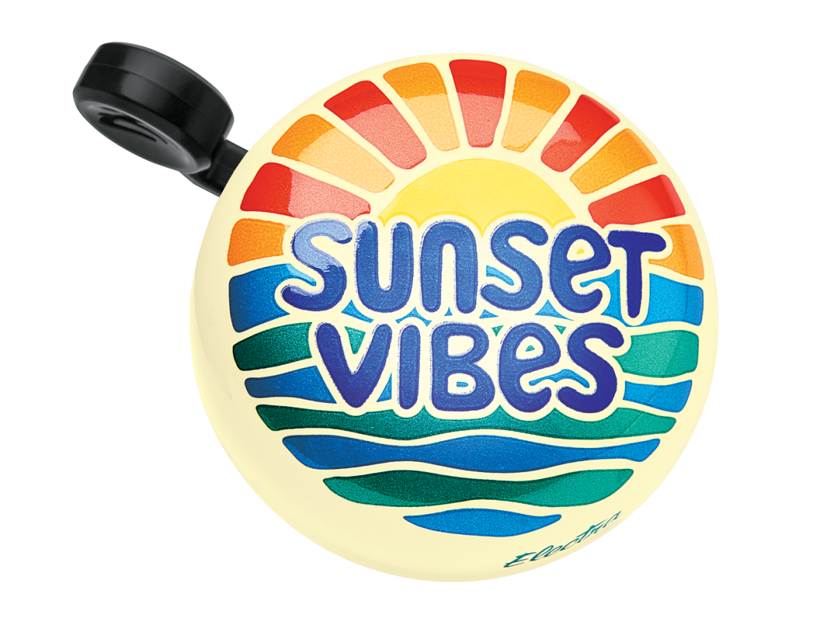 Electra bicycle bell with sunset vibes design featuring colorful sun rays and ocean waves