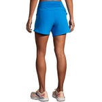Brooks Chaser 5-inch Women's Running Shorts in Azure Blue, rear view on model