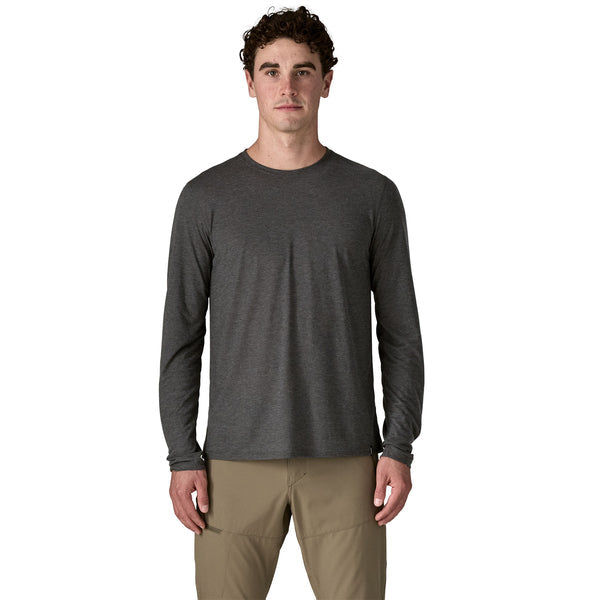 Male model wearing Patagonia Long-Sleeved Capilene Cool Trail Shirt in Ink Black, front view