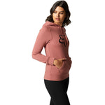 Woman wearing Fox Racing cranberry pullover fleece hoodie with fox logo