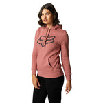 Woman wearing Fox Racing pullover hoodie in rose pink with black fox logo