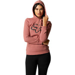 Woman wearing Fox Racing cranberry pullover hoodie with fox logo on chest
