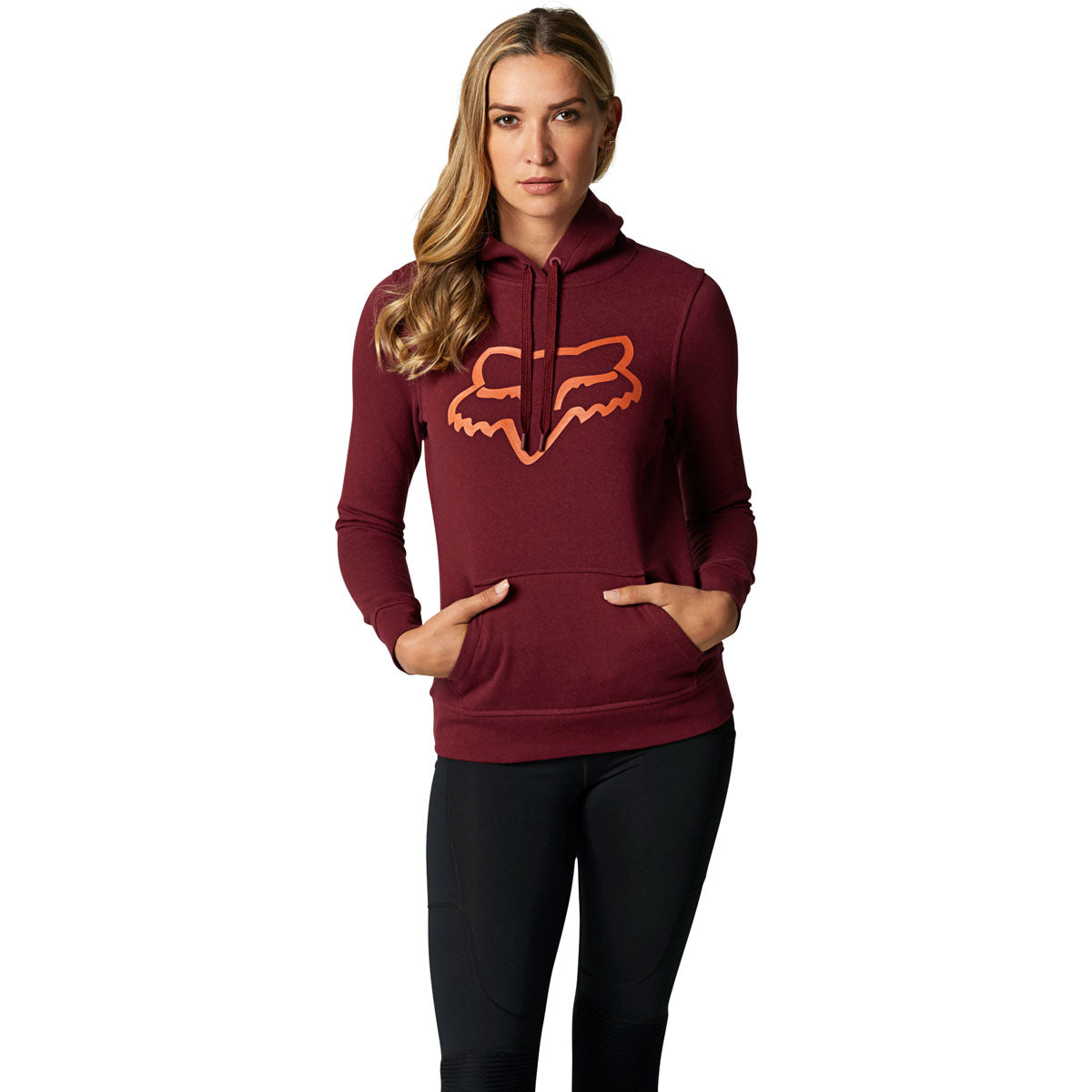 Woman wearing Fox Racing cranberry pullover hoodie with orange fox logo on chest