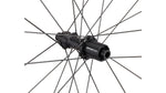 Specialized Roval Terra CLX rear wheel hub closeup showing Ratchet EXP freehub in satin black