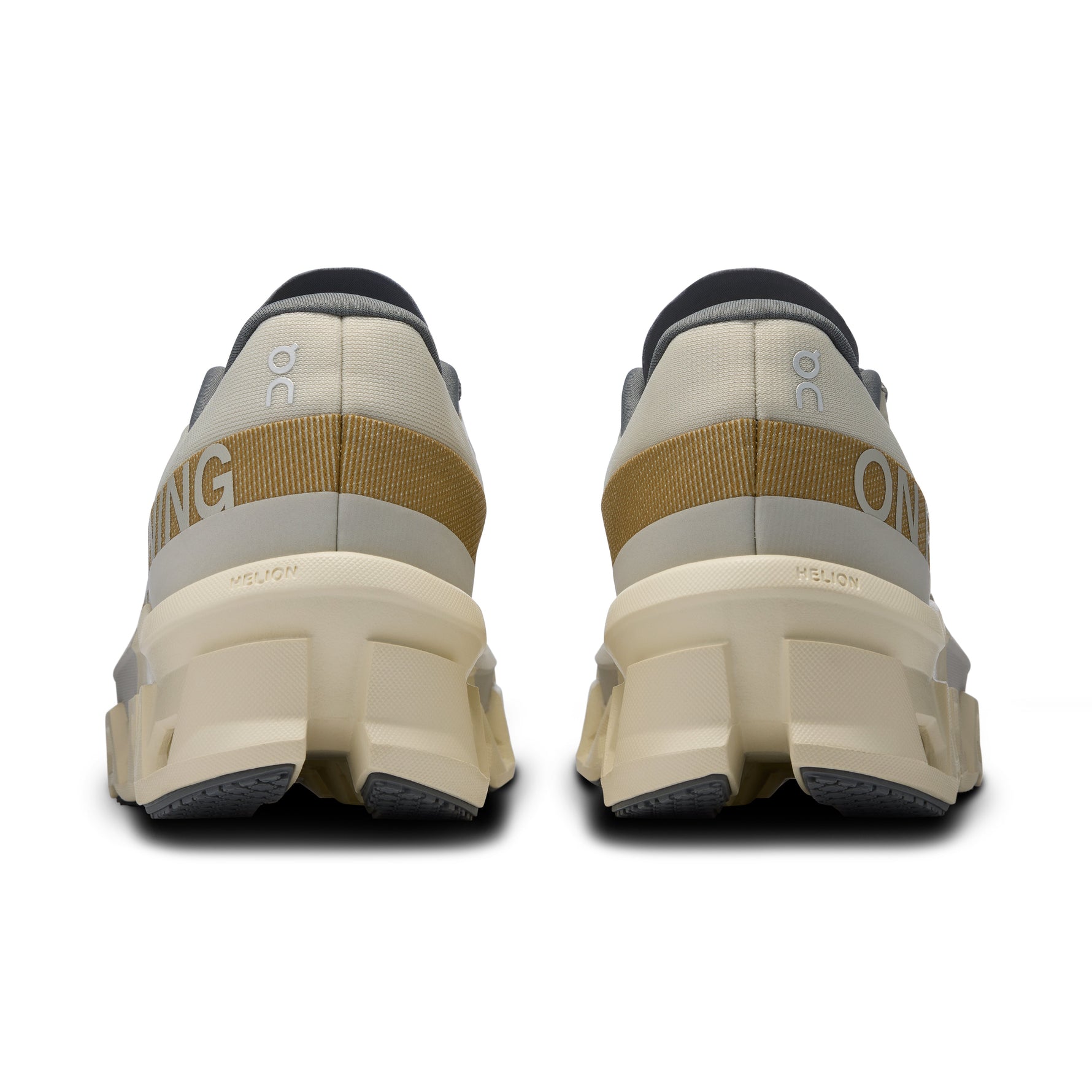 On Cloudmonster 2 running shoes in cream color with gold details, rear view