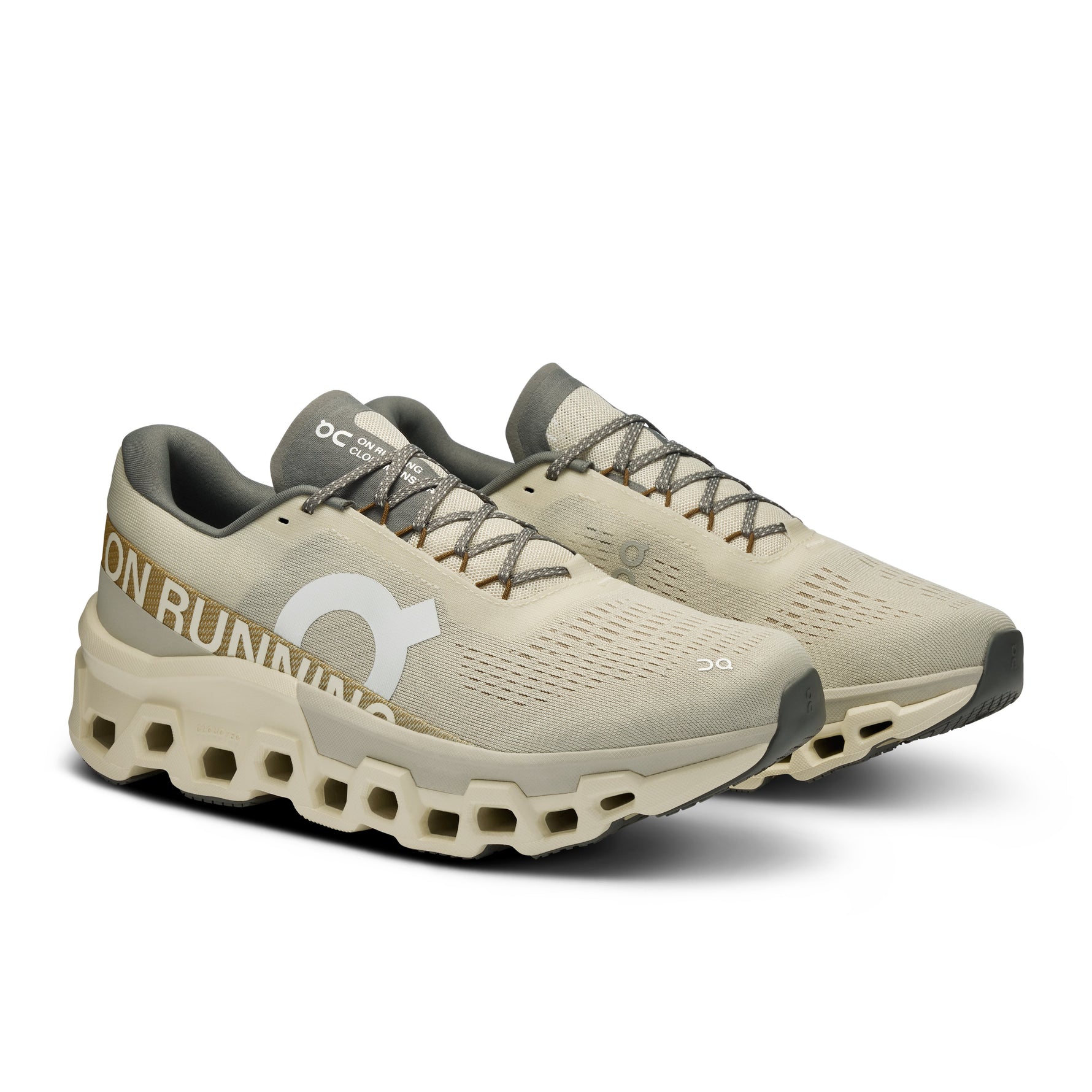 On Cloudmonster 2 running shoes in cream and sage green colorway