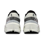 On Cloudmonster 2 running shoes in frost and rock colorway, rear view