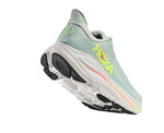 Hoka Clifton 10 women's shoe rear three-quarter view showing outsole and heel, Sea Glass colorway