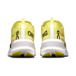 On Cloudboom Strike women's running shoes in limelight yellow and wolf gray colorway