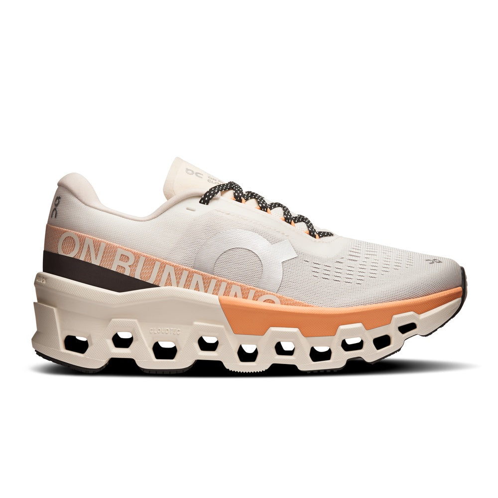 On Cloudmonster 2 women's running shoe in ivory and tangerine with CloudTec sole