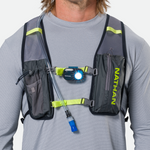 Nathan running vest with LED headlamp and hydration tube on model