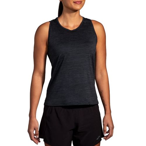 Woman wearing Brooks Luxe Tank in heathered deep black athletic top