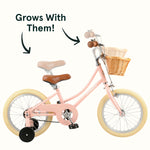 Retrospec Beaumont Mini 16-inch kids bike in blush pink with wicker basket and training wheels