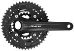 Shimano Alivio black crankset with dual chainrings on white background
