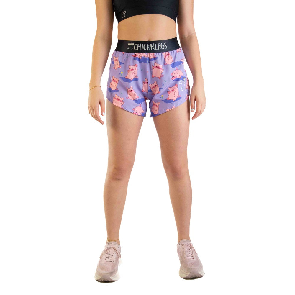 ChicknLegs women's purple shorts with cute pink pig pattern and black waistband