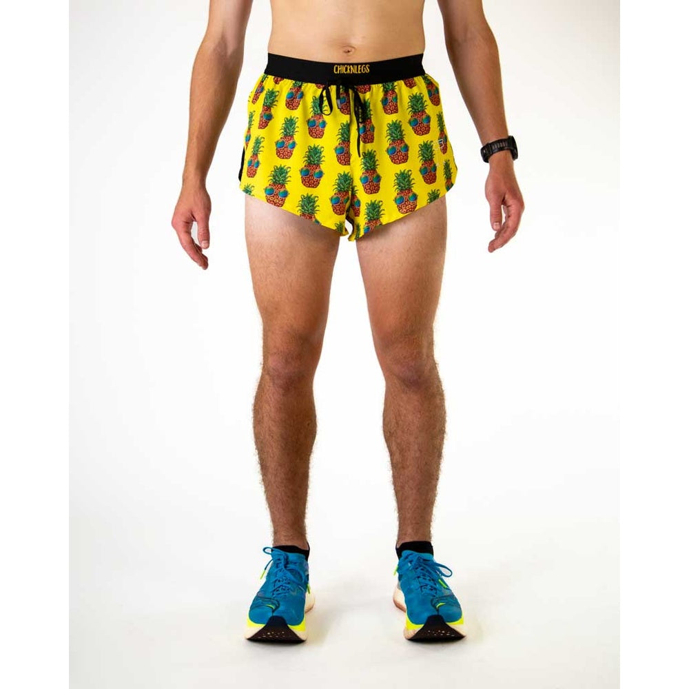 ChicknLegs 2-inch split running shorts in yellow Pineapple Express print worn by male model