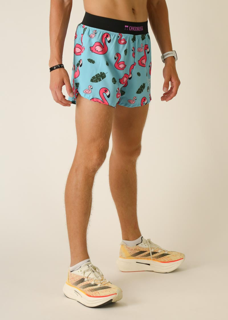 ChicknLegs men's light blue shorts with pink flamingo and tropical leaf pattern