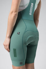 Gobik Matt Women's Bibshort in sage green showing professional cycling shorts with chamois padding