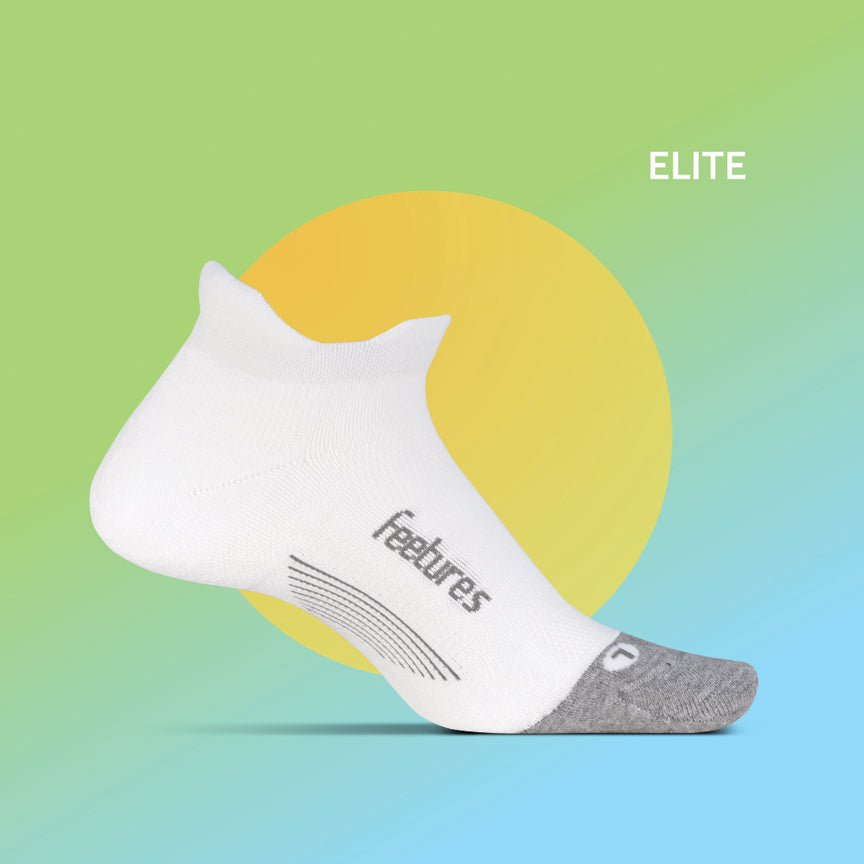 Feetures Elite Light Cushion Invisible no-show sock in white with gray accents