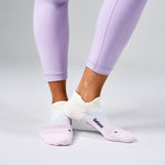 Feetures Elite Light Cushion Tab socks in Lilac Breeze worn with purple leggings