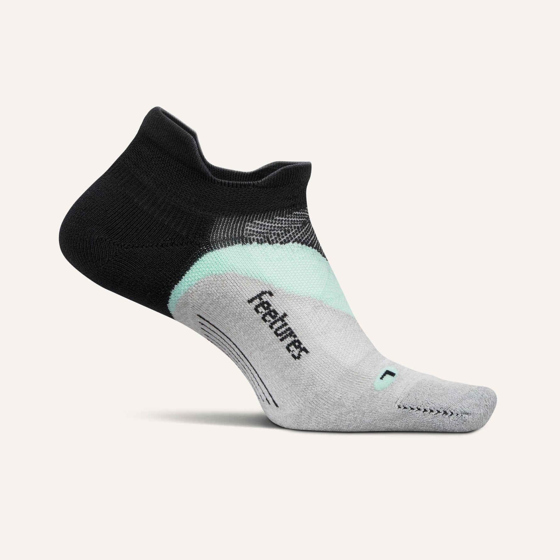 Feetures Elite Light Cushion No-Show Tab sock in Mint Chip colorway, studio shot