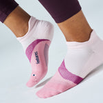 Feetures Elite Light Cushion Tab socks in Lilac Breeze pink worn on both feet