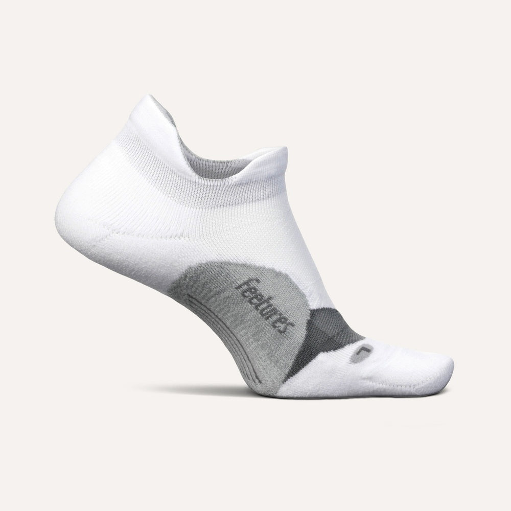 Feetures Elite Light Cushion Invisible no-show sock in white with gray cushioning zones