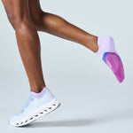 Feetures Elite Light Cushion Tab sock in Lilac Breeze worn by runner with On Cloud shoe