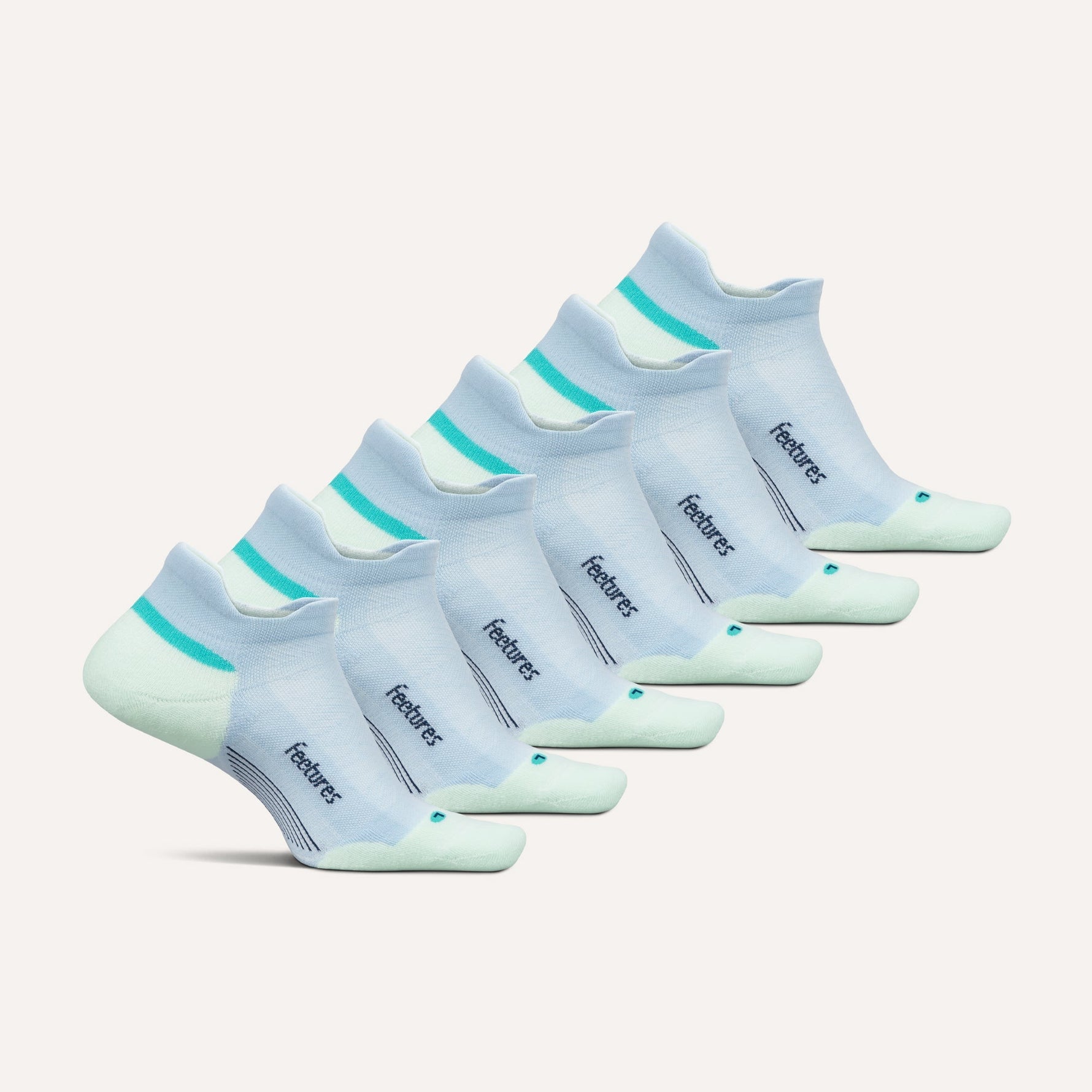 Feetures Elite Max Cushion Tab socks in Stone Ivy, six-pack set displayed in a row