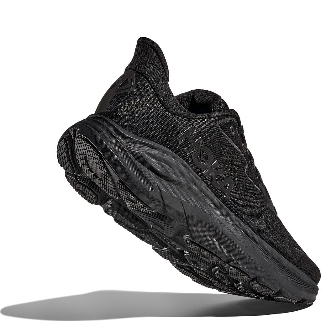Hoka Clifton 10 Women's black shoe angled view showcasing midsole cushioning and knit upper texture