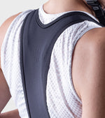 Close-up of ALE women's cycling bibshorts in black and white color scheme