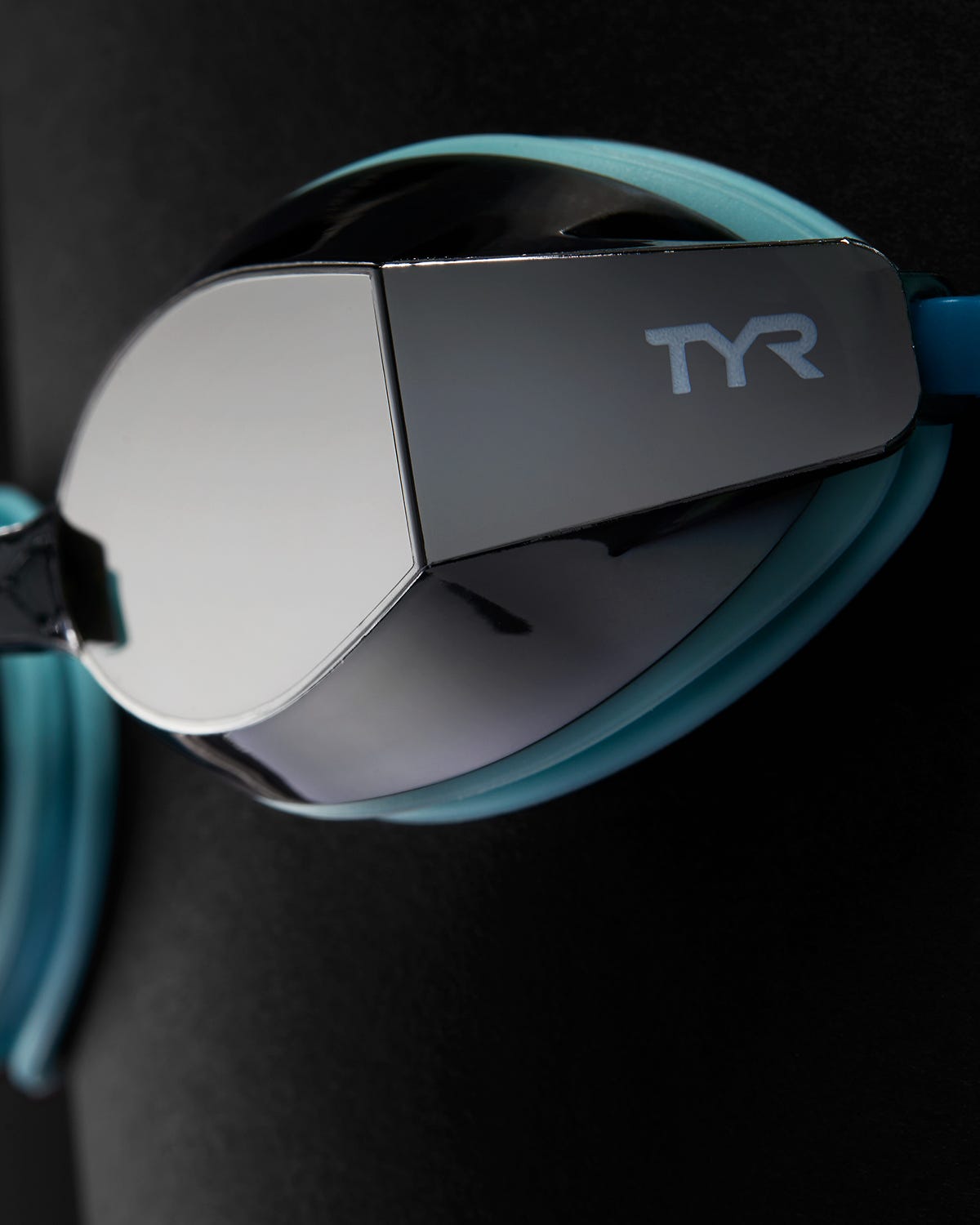 TYR Black Ops 140 EV racing goggles with mirrored lenses and teal frame